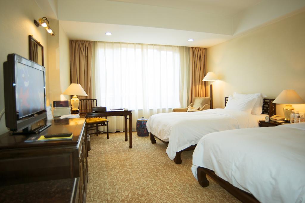 Datong Garden Hotel Стая снимка