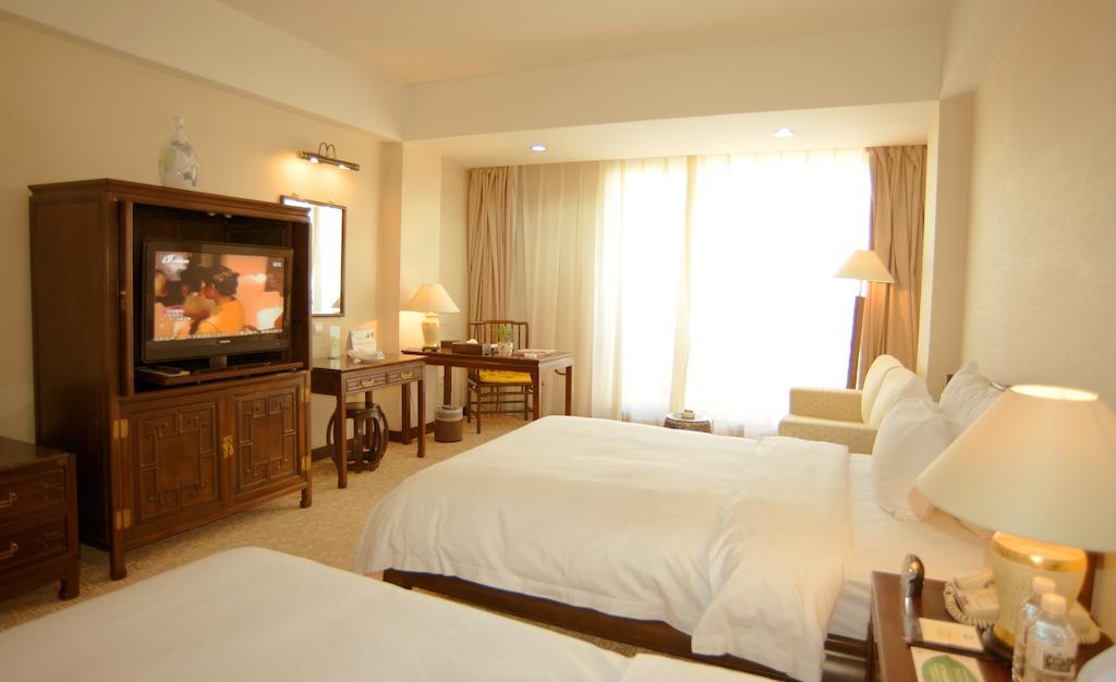 Datong Garden Hotel Стая снимка